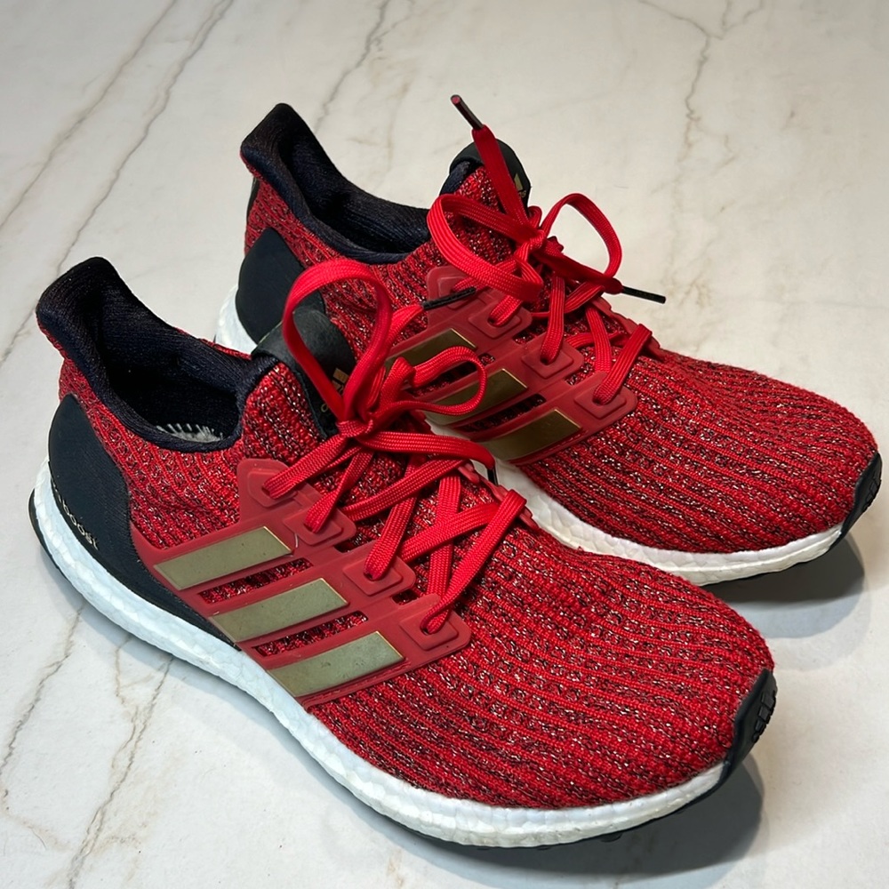 Adidas Ultraboost “Game of Thrones” Edition with Gold Accents (Size 8).